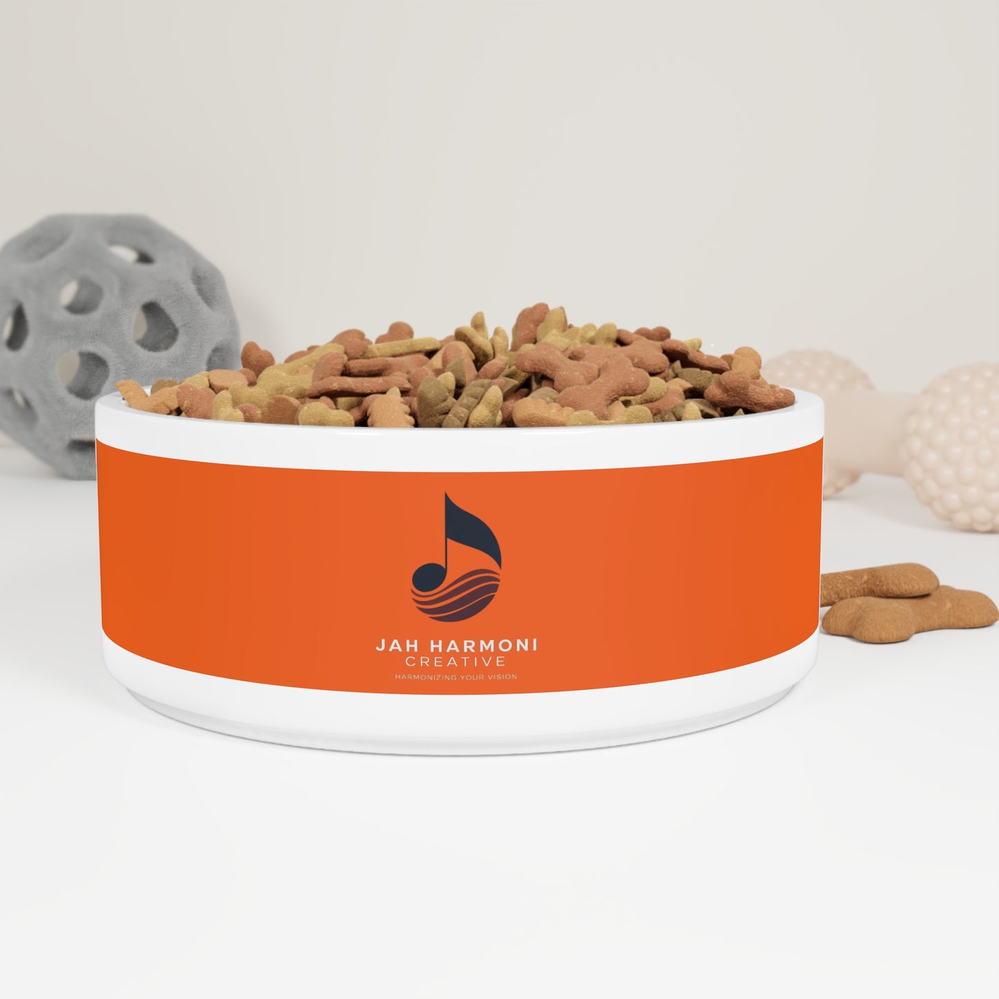 Orange Stripe Pet Bowl with 'Jah Harmoni Creative' Logo